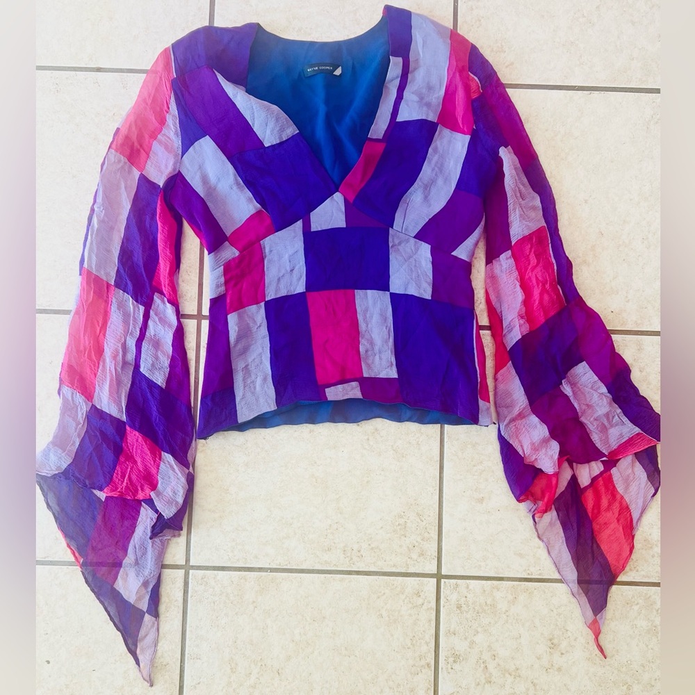 Wayne Cooper gorgeous 100% silk vintage top with bottom sleeves flared.